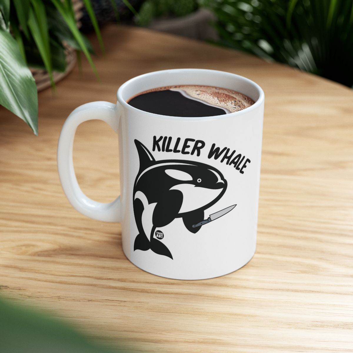Killer Whale Cartoon Mug with Knife Design