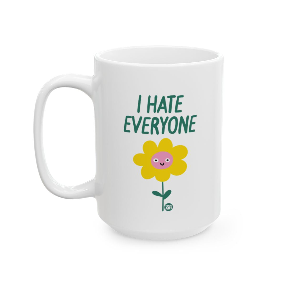 White ceramic mug featuring a smiling flower illustration with the words “I Hate Everyone,” designed by Todd Art