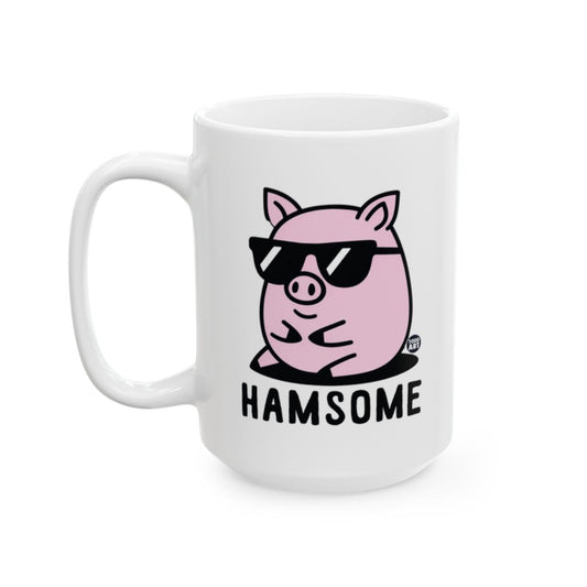 White ceramic mug featuring a pig wearing sunglasses with the word “Hamsome,” designed by Todd Art